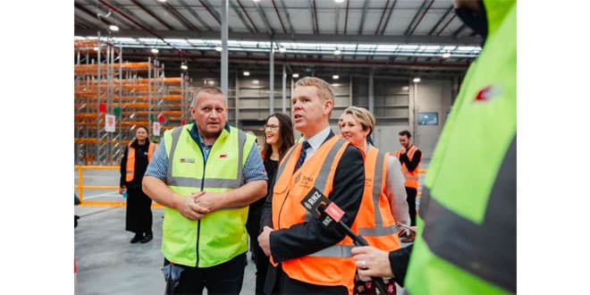 New Zealand’s PM gets to see the benefits of LiBiao Robotics parcel sorting robots up close